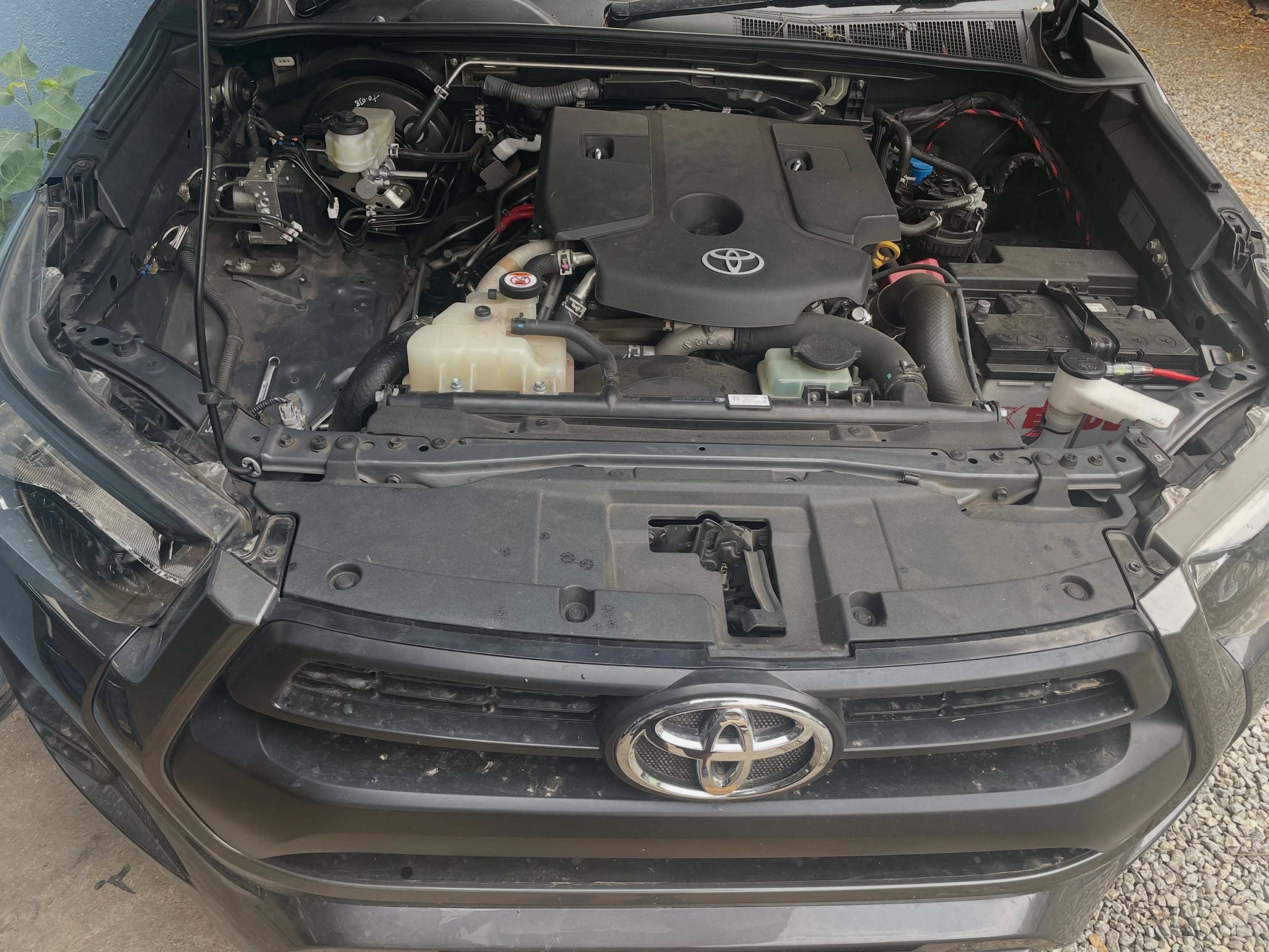 Toyota Hilux engine bay with its bonnet open